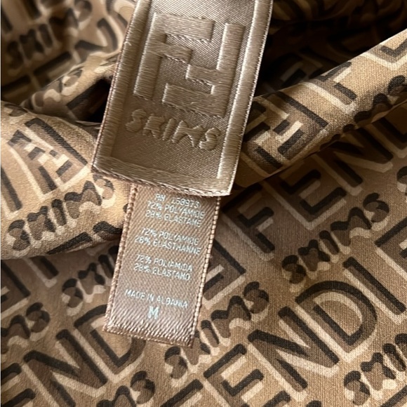 Skimsxfendi  bodysuit logo hard to find! - Picture 3 of 8